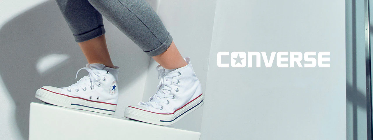 Wer war Chuck Taylor und was hatte er mit Converse gemeinsam?